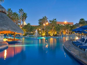 Resort pool at sunset