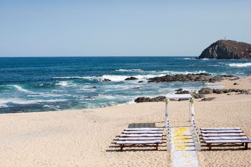 Beach view with wedding arch and seating